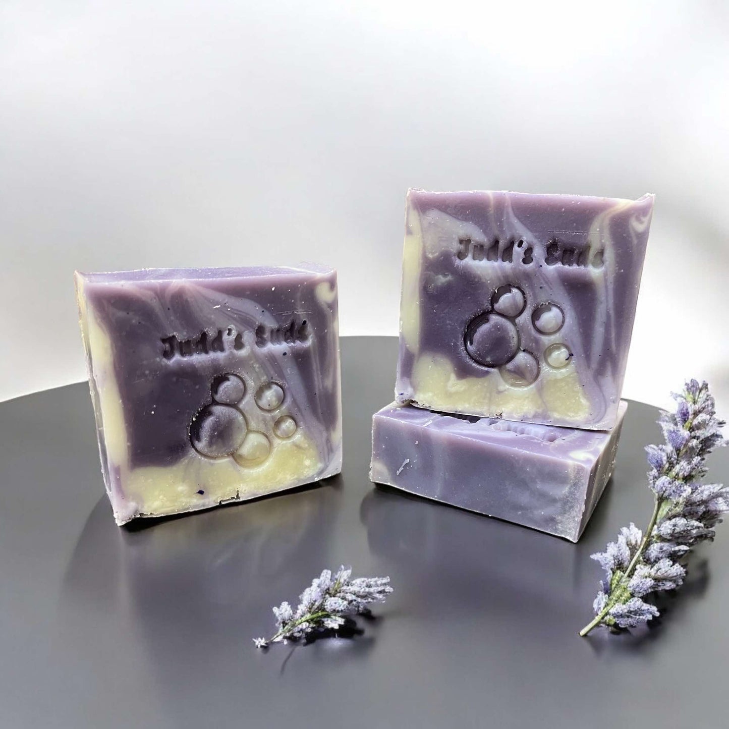 4oz soap bar, colored purple and white, scented with lavender essential oil