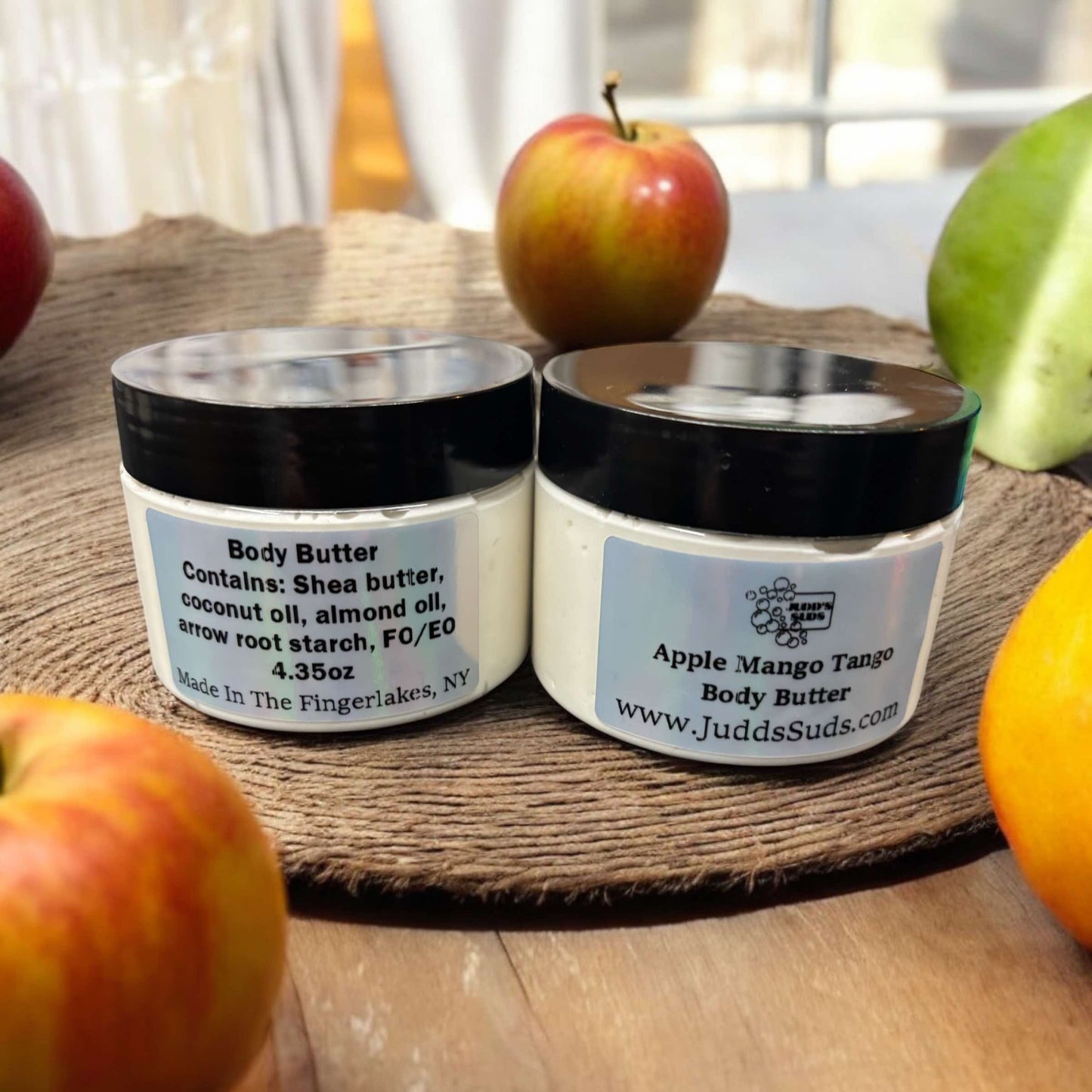 4oz jar of body butter, plain white color, scented with apple mango tango fragrance oil.