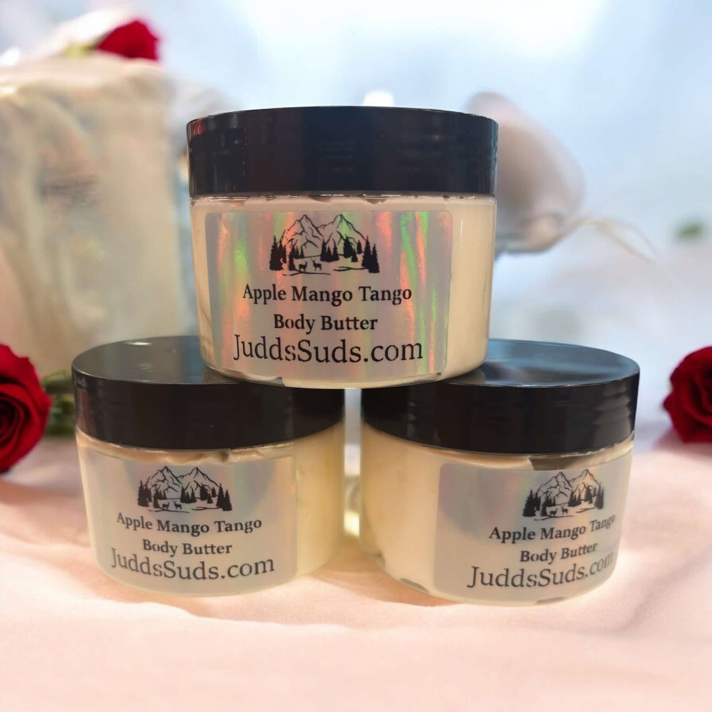 4oz jar of body butter, plain colored, scented with apple mango tango fragrance oil