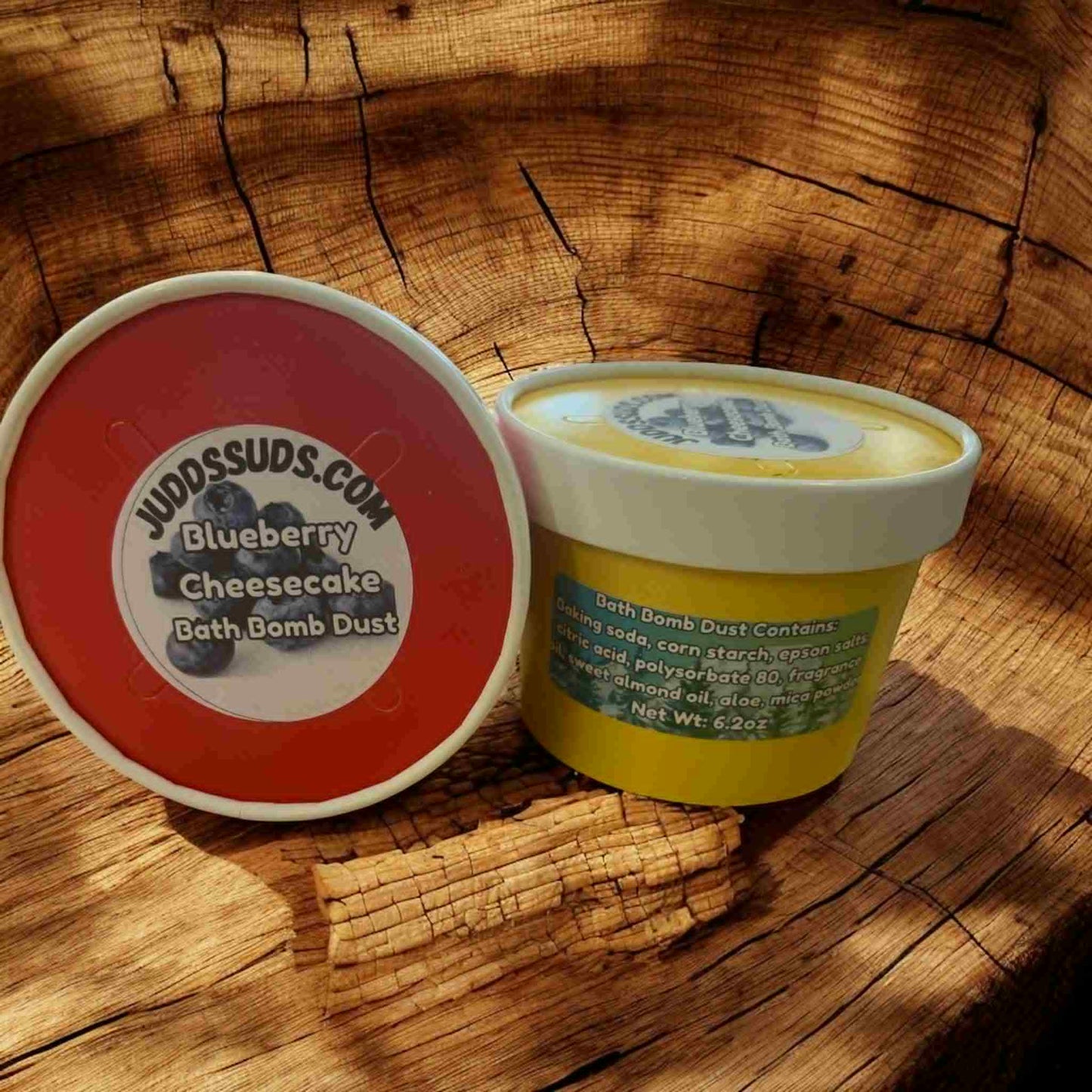 6.8oz tub of bath bomb dust, scented with blueberry cheesecake bath bomb dust