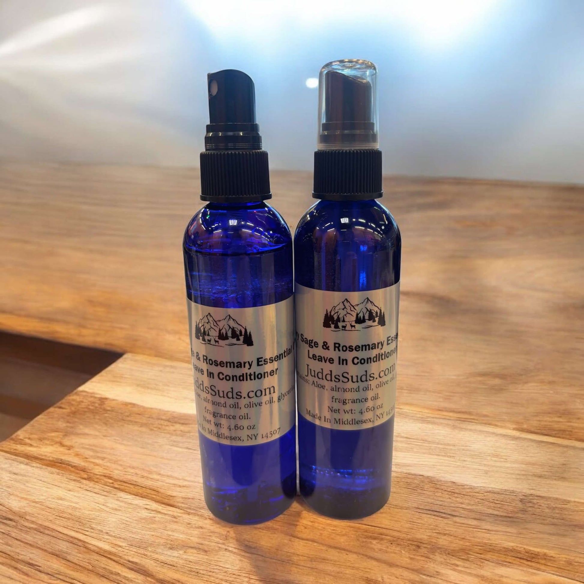 4oz spray bottle, filled with nourishing oils to help detangle and smooth your hair, scented with clary sage and rosemary essential oil