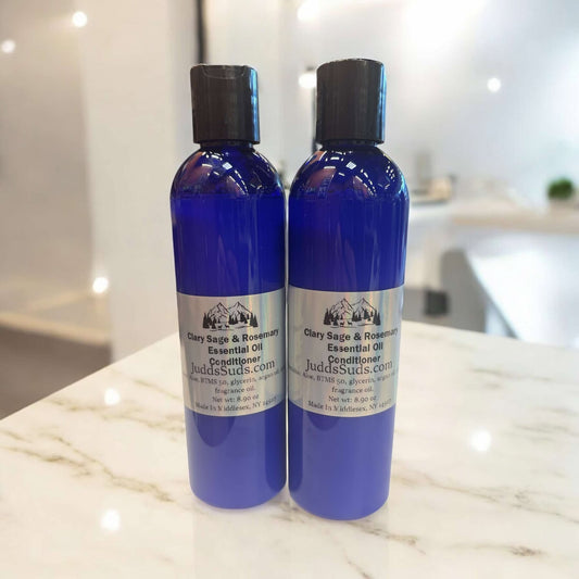 8oz bottle of liquid conditioner, scented with clary sage & rosemary essential oil