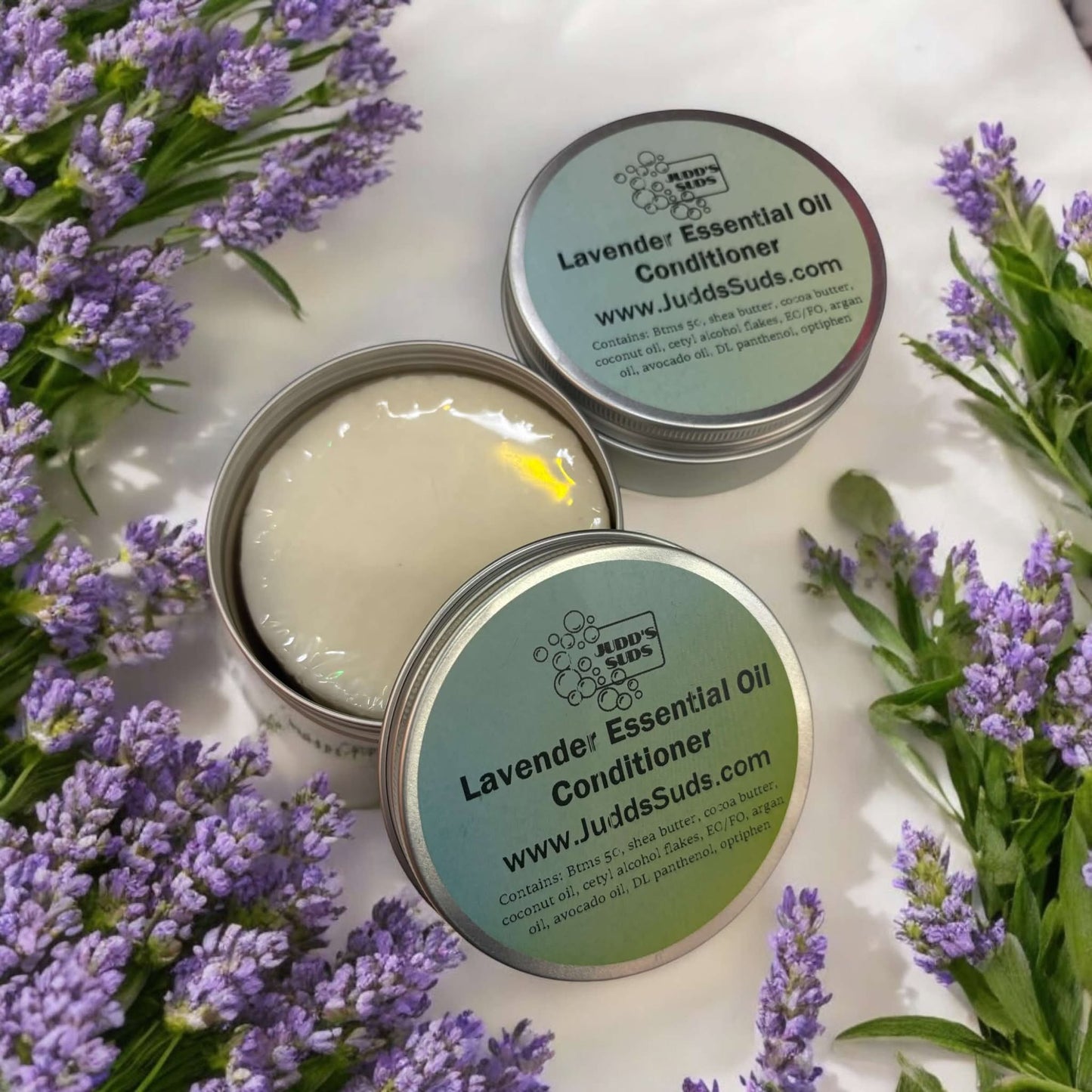 5oz solid conditioner bar, white in color, scented with lavender essential oil. Comes in a tin