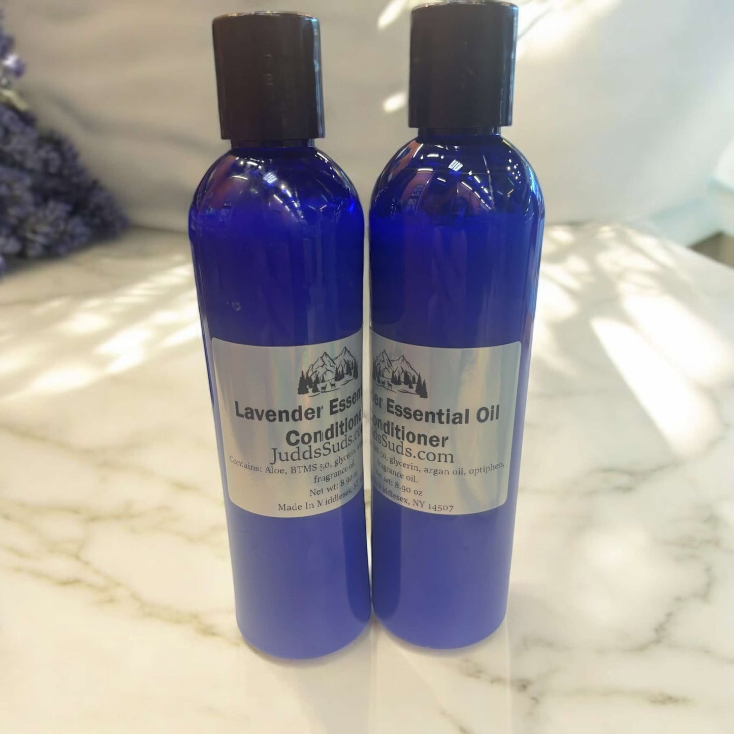 8oz bottle of liquid conditioner, scented with lavender essential oil