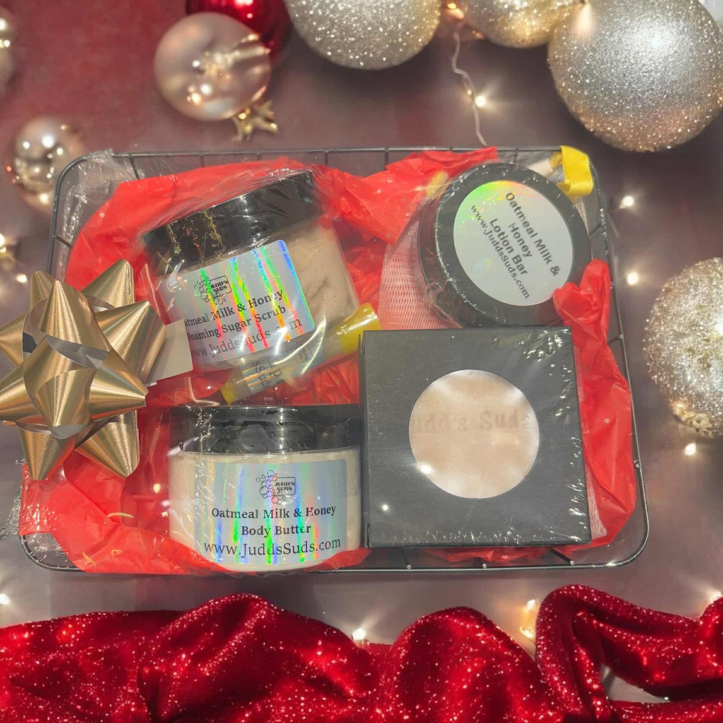 gift basket with, soap bar, soap bag, body butter, foaming sugar scrub, and lotion bar scented with oatmeal milk and honey fragrance oil, and a lip balm