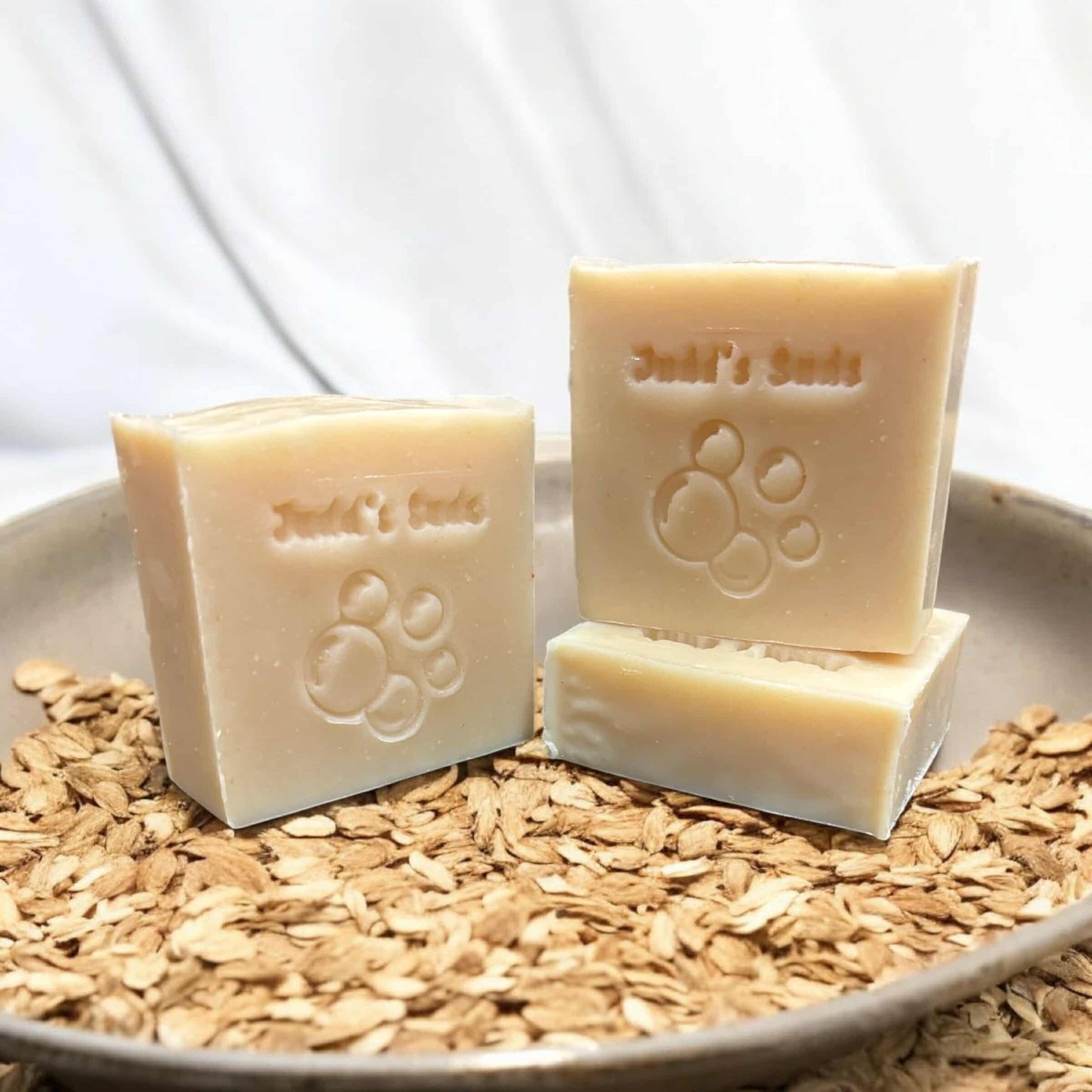 4oz bar soap, cream color. scented with oatmeal milk & honey fragrance oil