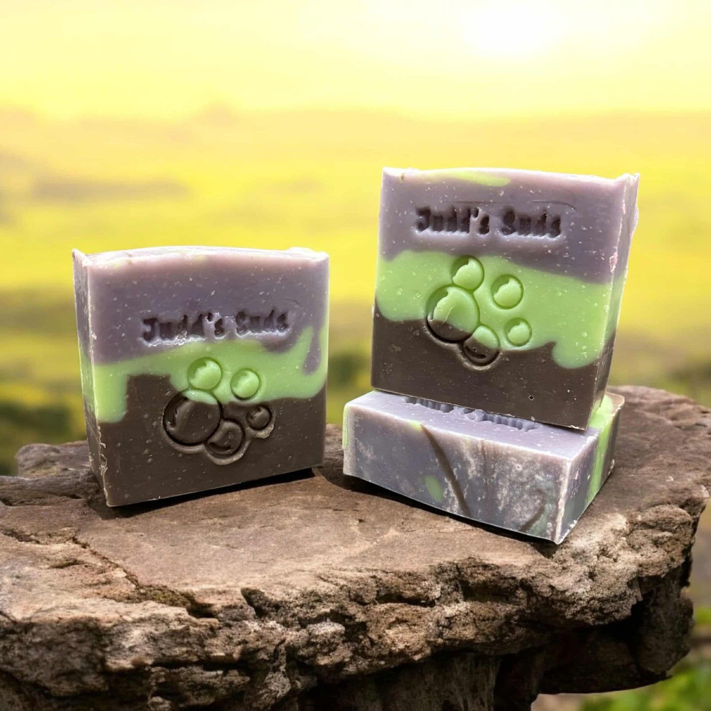 4oz soap bar, colored purple , green and brown, scented with patchouli sandalwood fragrance oil