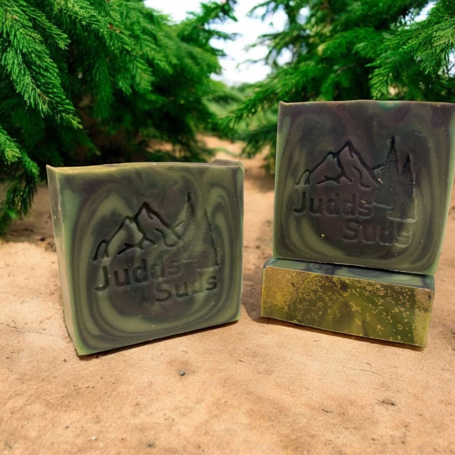 4oz bar soap, colored green , brown , and gold. Scented with pine forest fragrance oil