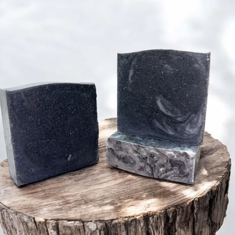 4oz soap bar, colored black, contained activated charcoal and pumice. Unscented