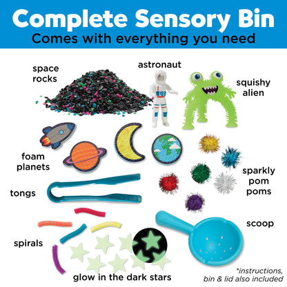 Alien sensory bin, contains space rocks, astronaut toy, squishy alien, foam planets, sparkly pom poms, tongs, spirals, glow in the dark stars, and scoop.