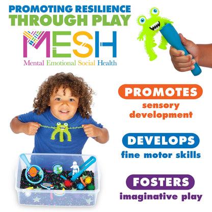 Alien sensory bin, contains space rocks, astronaut toy, squishy alien, foam planets, sparkly pom poms, tongs, spirals, glow in the dark stars, and scoop.