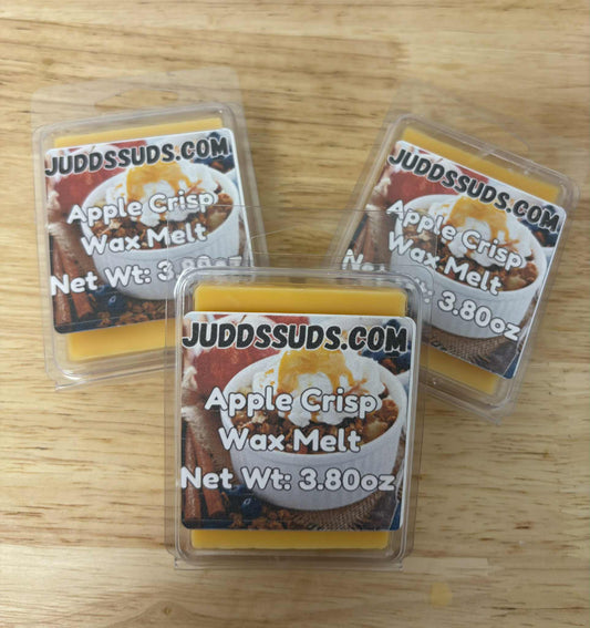 Three Apple Crisp Wax Melts from Judds Suds on a wooden surface