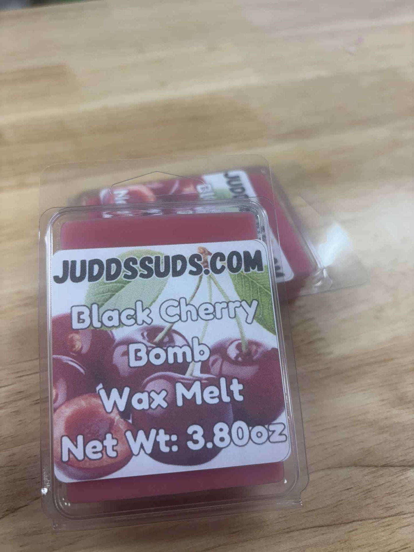 3.8z wax melt, colored red, scented with black cherry bomb fragrance oil