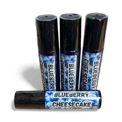 Four cuticle oil roller  with blueberry cheesecake flavor on a white background