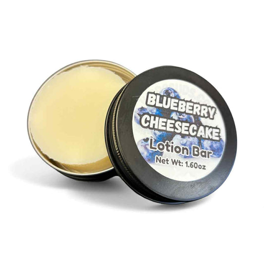 Blueberry Cheesecake lotion bar with a black lid on a white background