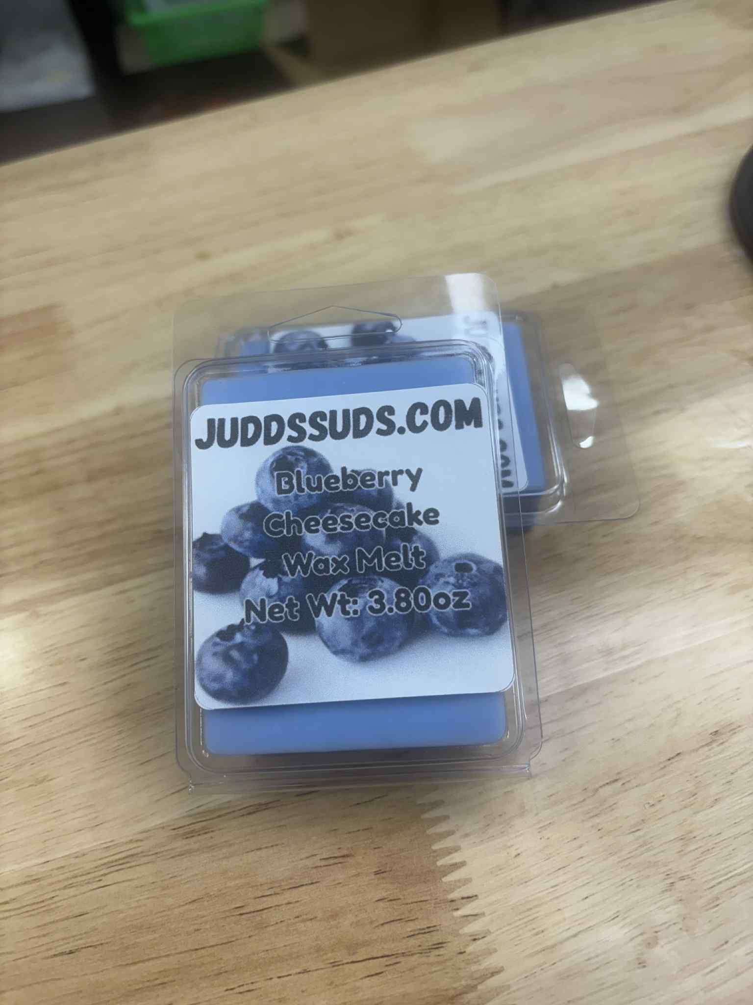 3.8oz wax melt, colored blue, scented with blueberry cheesecake fragrance oil