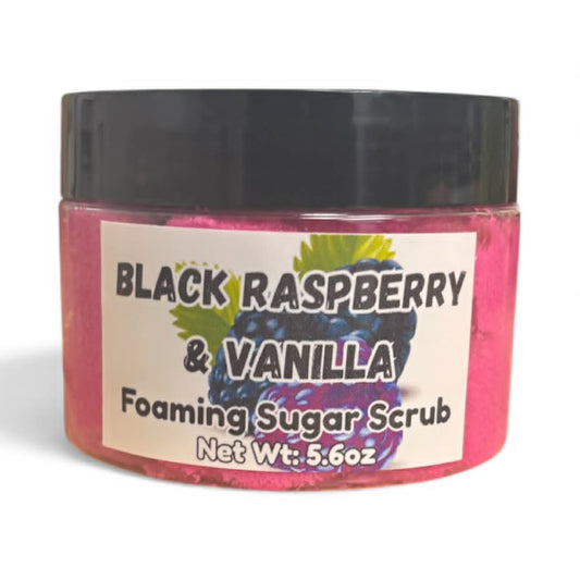 Jar of black raspberry and vanilla foaming sugar scrub with a black lid on a white background
