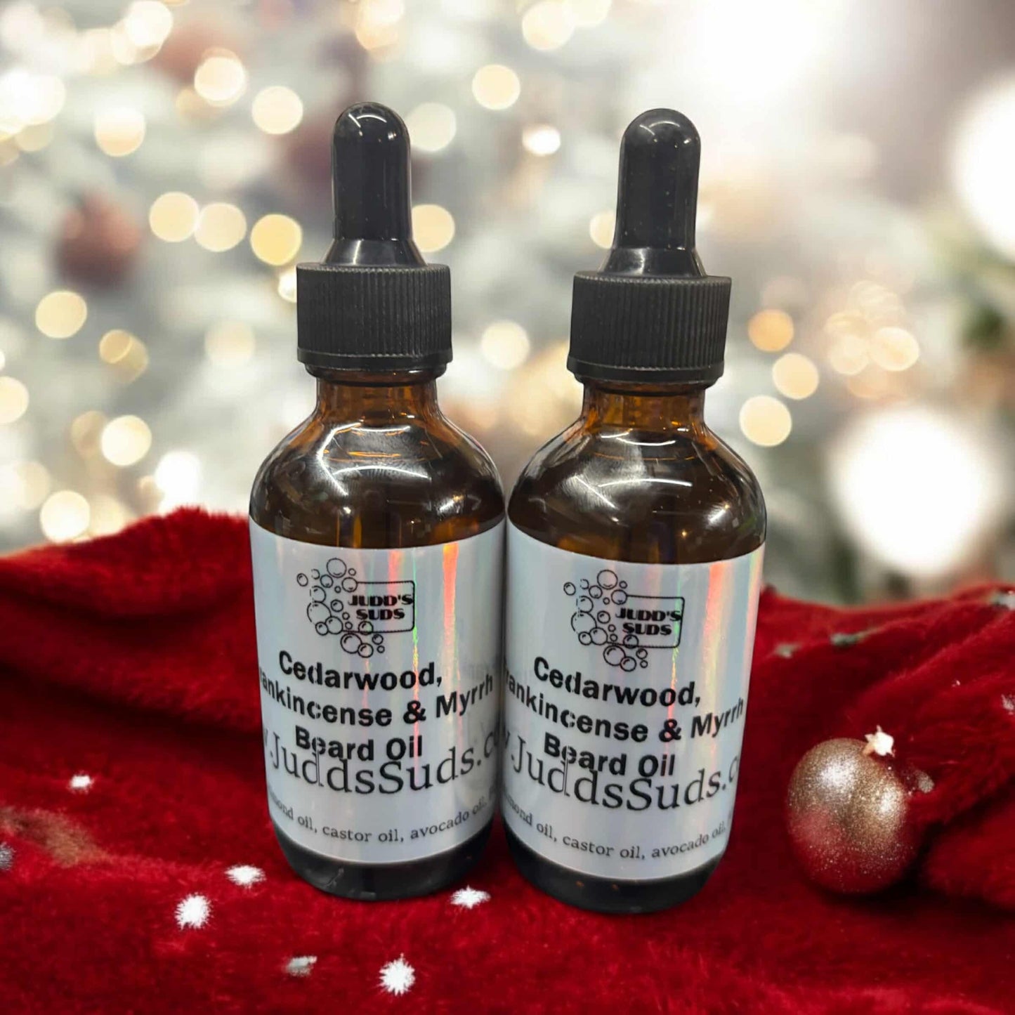 Glass bottle, with glass dropper containing beard oil. Scetned with cedarwood essential oil, frankincense and myrrh fragrance oil.