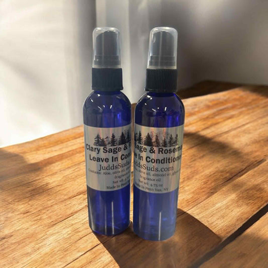 4oz spray bottle, filled with nourishing oils to help detangle and smooth your hair, scented with clary sage and rosemary essential oil