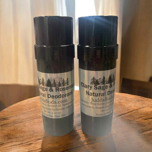 Black canister containing 3oz of deodorant, plain white colored, scented with clary sage & rosemary essential oil
