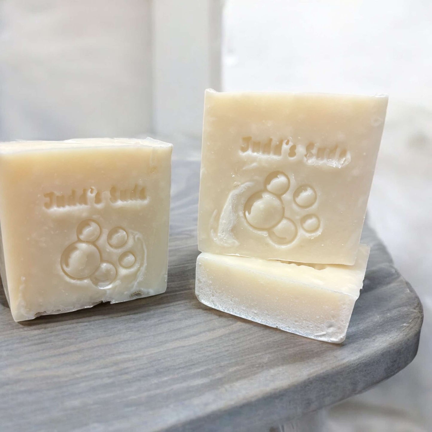4oz soap bar, light cream color scented with clean fresh cotton fragrance oil