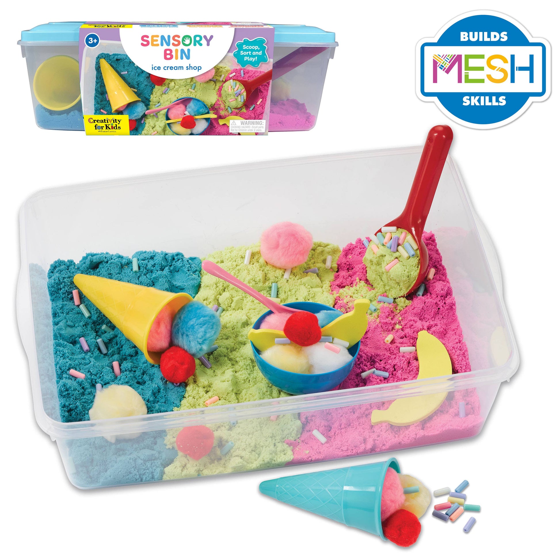 Sensory bin contains, sensory sand, foam bananas, ice cream cones, spoon, ice cream scoop, rainbow beads, bowl, and pom poms