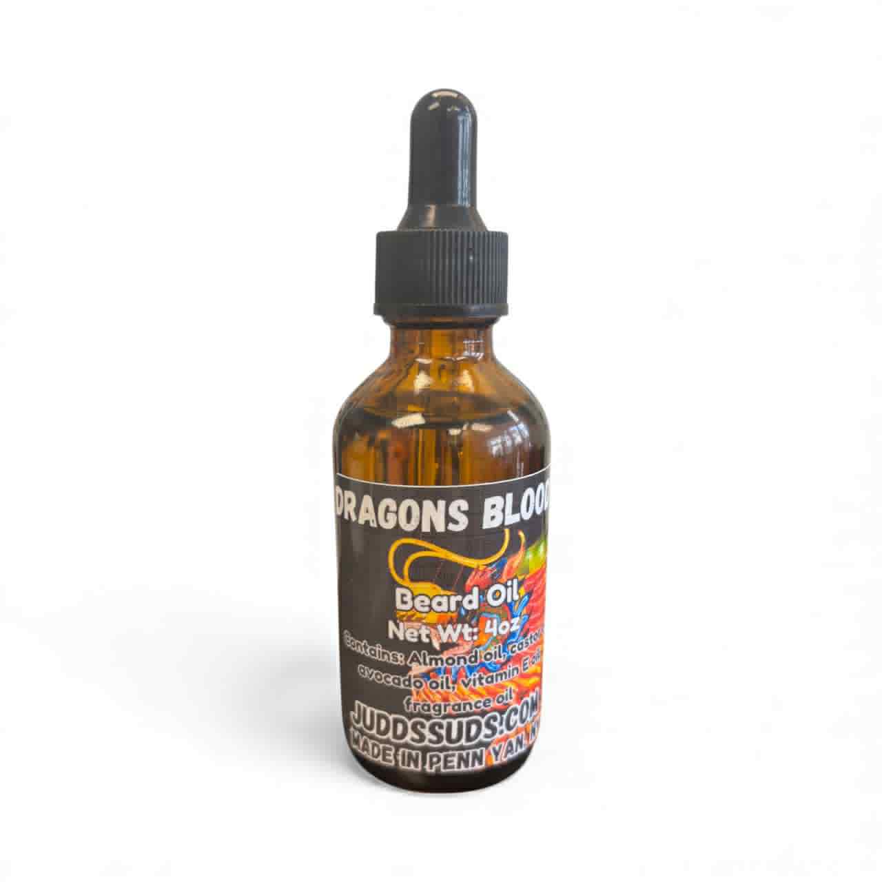 Bottle of 'Dragon's Blood' beard oil with a colorful label on a white background