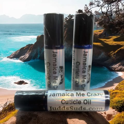 1.25 glass roller bottle, contains almond, avocado, castor oil, and vitamin E oil. Scented with Jamaica me crazy fragrance oil