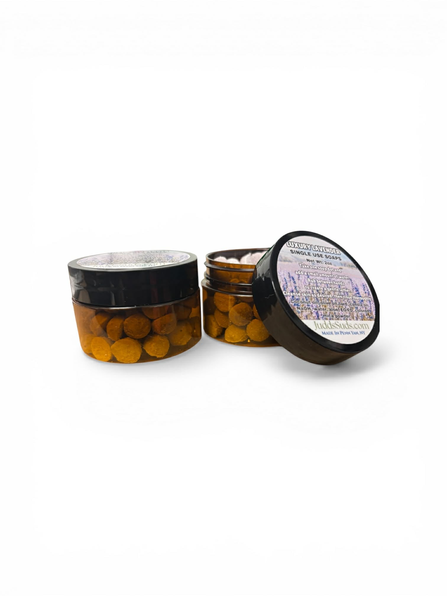 Two open jars with round contents on a white background