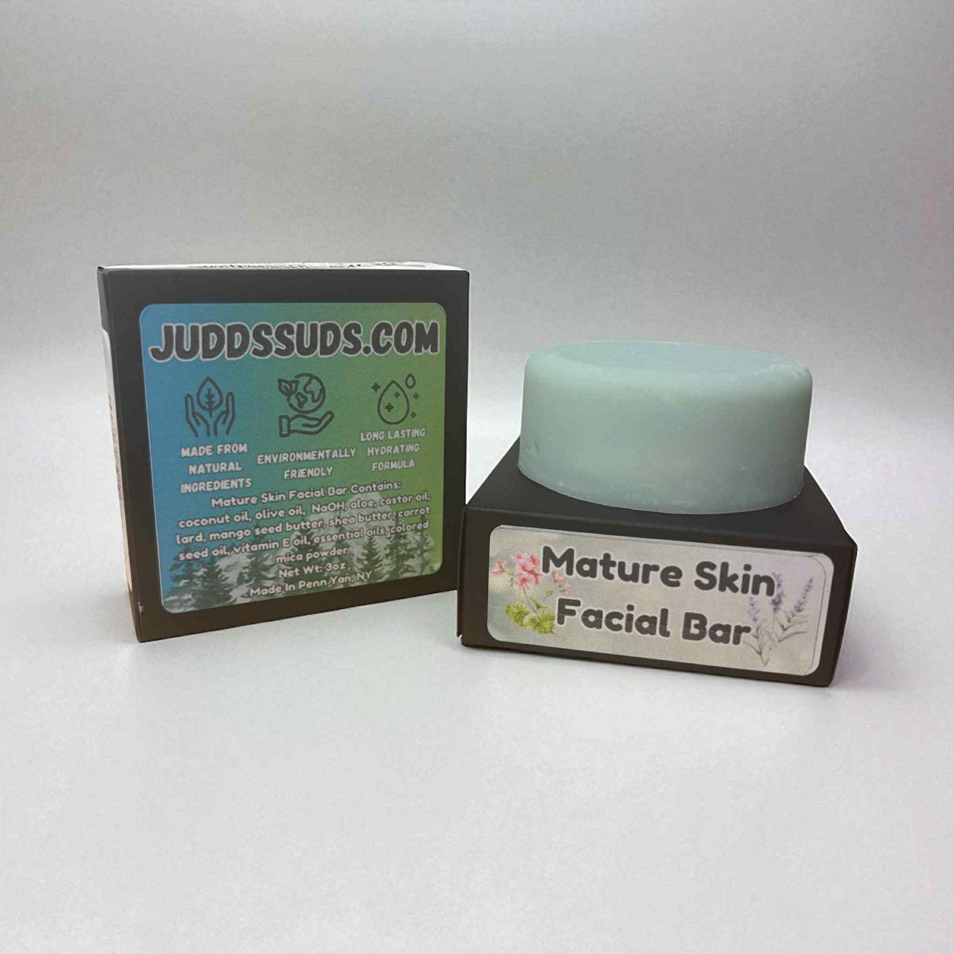 Mint green facial bar with packaging on a white background