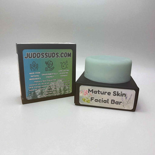 Mint green facial bar with packaging on a white background