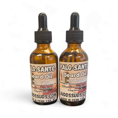 Two bottles of Palo Santo Beard Oil on a white background