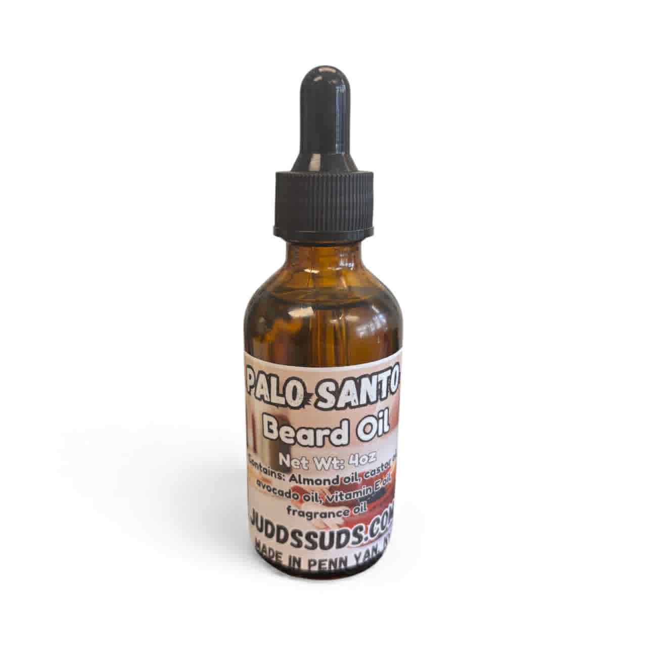 Bottle of Palo Santo beard oil with a dropper on a white background