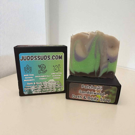 Patchouli Sandalwood bath and body soap with packaging on a white surface