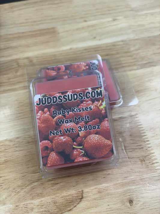3.8oz wax melt, colored red, scented with ruby kisses fragrance oil