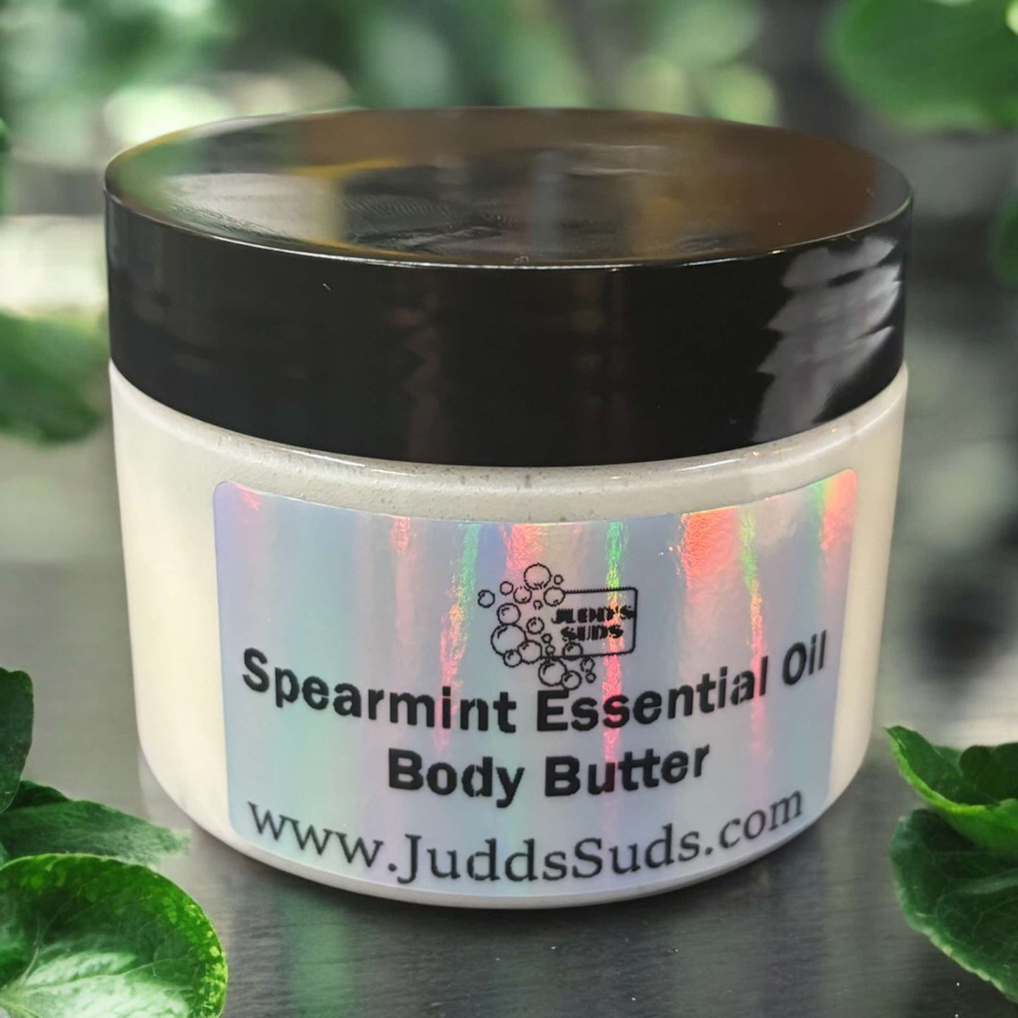4oz jar of body butter, plain white color, scented with spearmint essential oil