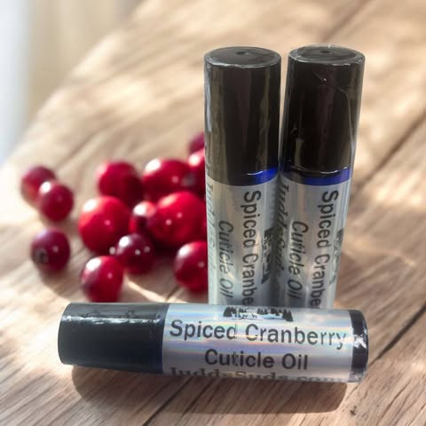 1.25 glass roller bottle, contains almond, avocado, castor oil, and vitamin E oil. Scented with spiced cranberry fragrance oil