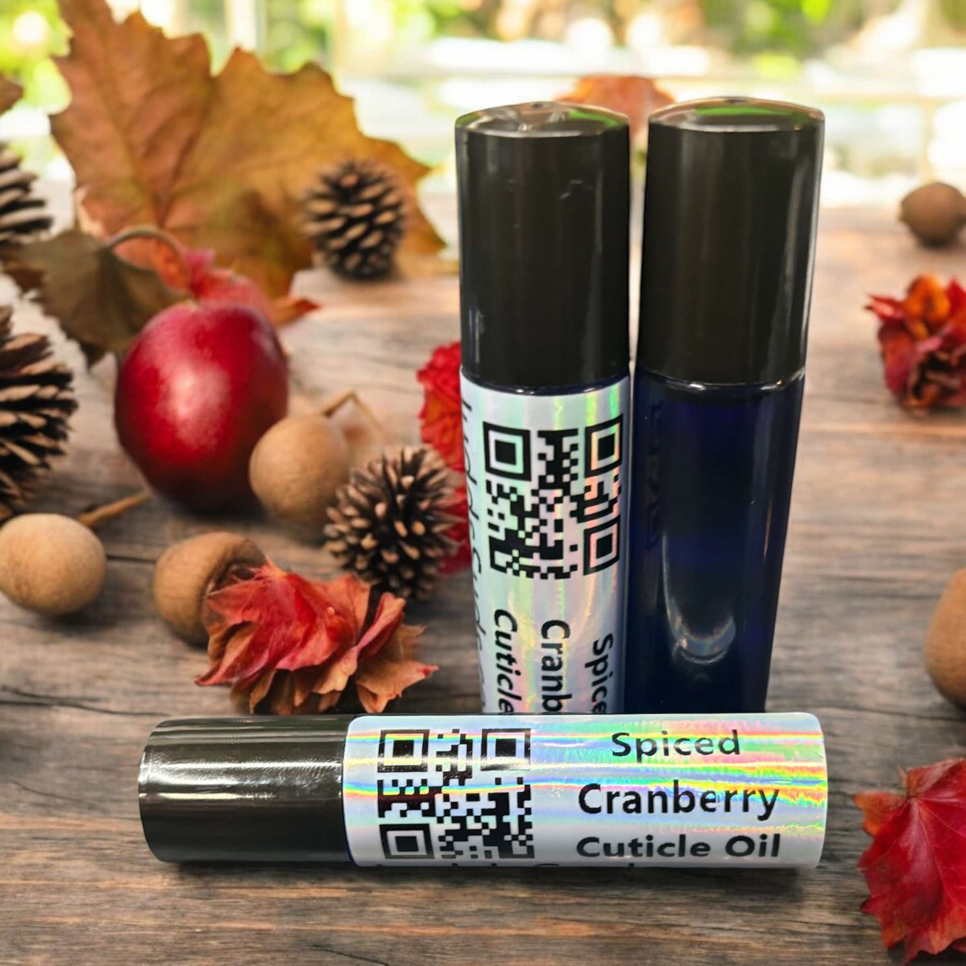 1.25 glass roller bottle, contains almond, avocado, castor oil, and vitamin E oil. Scented with spiced cranberry fragrance oil