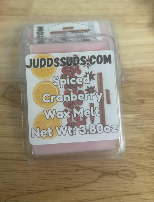 Spiced Cranberry wax melt packaging with Judds Suds.com label on a wooden surface