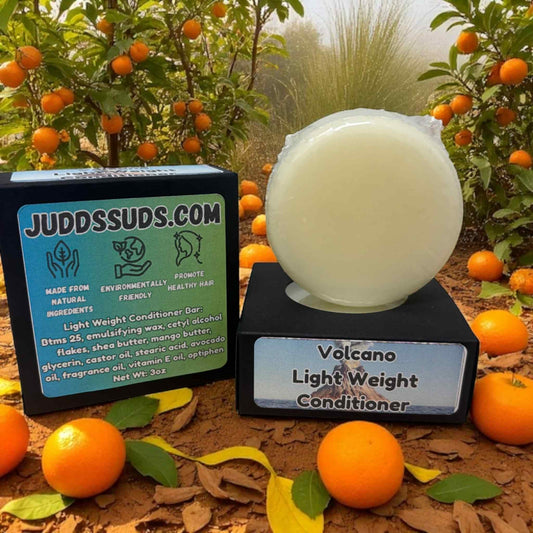 Lightweight conditioner bar with packaging on a natural background with oranges and leaves