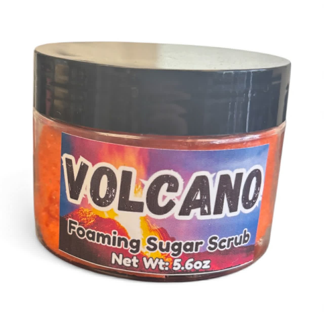 Jar of 'Volcano' foaming sugar scrub with colorful label on a white background