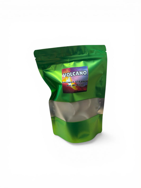 Green packaging of Volcano shower steamers on a white background